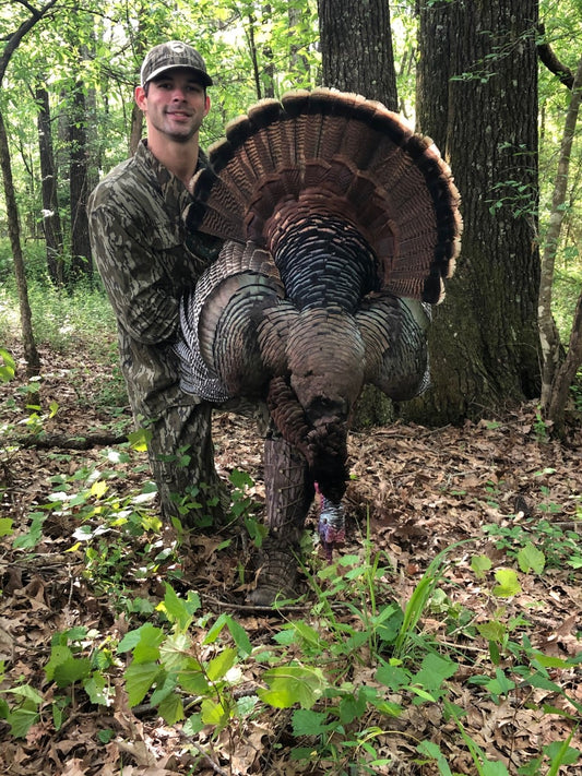 Hunter Farrior holding Eastern Wild Turkey blog on calling and woodsmanship how to call turkeys and how to turkey hunt without using calls. Founder Spring Legion Turkey Hunting Co. Mississippi